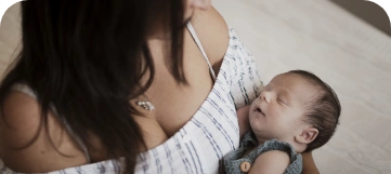 mother-holding-cute-little-baby (1)
